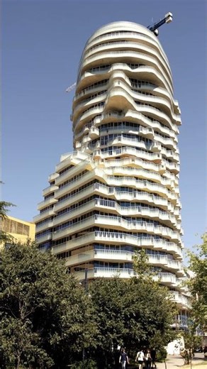 The Skyscraper That Has a FACE? 🤯🇦🇱 #Architecture #Bizarre