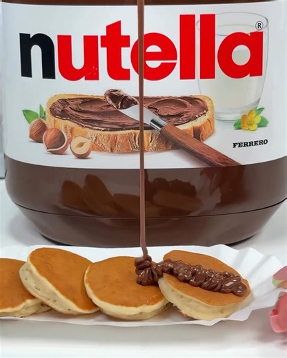 2.3M views · 5.7K reactions | This Nutella dispenser is what's missing in my life  | FOODbible | Facebook