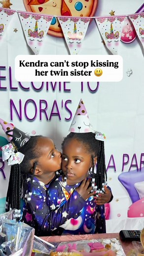 Unbreakable Bond: Twin Sisters Sharing Sweet Moments