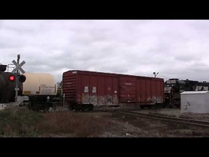 Norfolk Southern SD60 6652 shoves NS G-68 through downtown Valdosta, GA