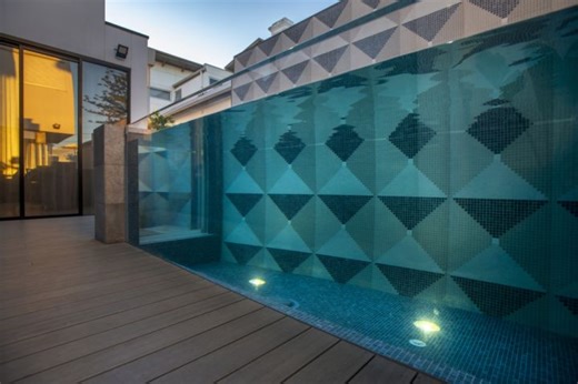 This sleek glass tank is one of Australia’s best backyard pools