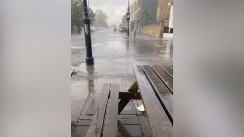 Heavy rain and hail batter London