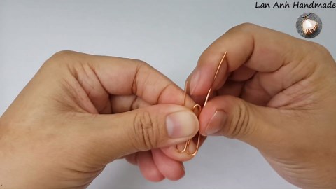 Asymmetric spiral Earcuff inspired by Egyptian Coil from copper wire 476