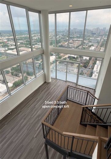 Midtown Houston Two story luxury loft penthouse apartment with winding staircase, floor to ceiling windows, split level floor plan, open floor plan. Spacious unit over 2400sqft LED mirrors, 24hr concierge, luxury high rise amenities, gym, resort style pool, views of the city, natural light, soaking tub and stand up glass shower. This penthouse is rarely available! #houstonapartments #loftapartment #openconcept #comehelpglo #houstonapartmentlocator