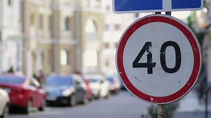 Speed limit sign in the street - Free Stock Video