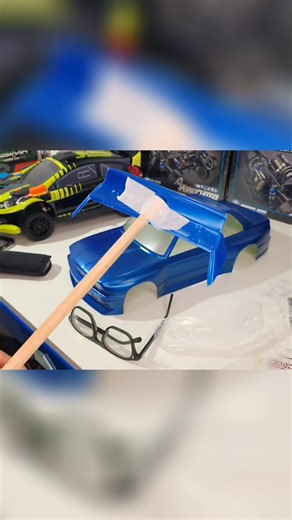The spoiler has been given four light coats on the underside. It rained flat to dry. The next video will feature the construction of everything together, including putting the decals on. Have you ever built your own RC car? #RCcar #spoiler #build #decals #construction | Radio-controlled.co.uk