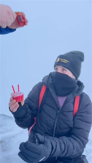 Snowdon Documentary: Final Episode Against all odds, questionable planning, and rapidly declining morale, they did in fact reach the summit of Snowdon. What greeted them at the top was not the sweeping, majestic views you see on postcards, but a full sensory experience of wet, cold, cloudy nothingness. No view whatsoever. Just wind, mist, and the strong feeling that Snowdon was personally unimpressed by their effort. Despite this, Dad had come prepared with a tiny birthday cake for Beth, which f