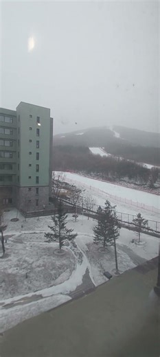 view from hotel window lake songhua ski resort 2025