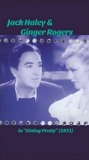 Jack Haley (the Tin Man) singing to Ginger Rogers as she accompanies him in "Sitting Pretty" (1933).