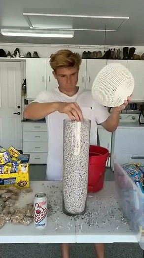 Dropping 50,000 Pop-its fireworks off a MASSIVE building… #shorts