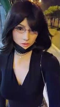 Walking on the street with Female bodusuit and mask.