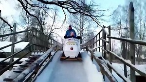 DIY dad builds a backyard bobsled track
