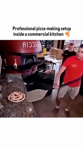 Candy on Instagram: "This video shows a professional pizza-making setup inside a commercial kitchen, offering a clear look at how modern pizzerias balance speed, consistency, and food safety at scale. What’s happening in the clip The pizza is handled using a long metal pizza peel, which allows staff to insert and retrieve pizzas without placing hands near extreme heat The oven appears to be a high-temperature deck oven or conveyor oven, both commonly used in commercial operations Temperatures in