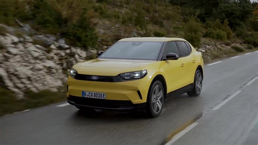 The new Ford all-electric Capri in Vivid Yellow Driving Video