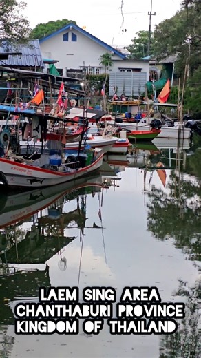 "Fishing Adventures: A Young Boy's Day in the Colorful Canal Village!"
