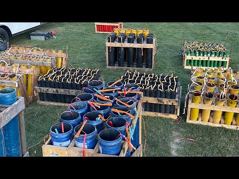 Hand lighting a Professional Fireworks Display Behind the scenes!