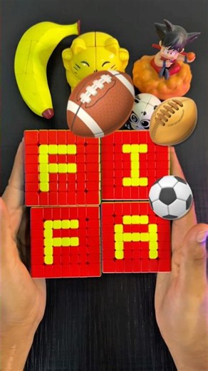 I built FIFA out of 4 GIANT Rubik's Cubes! ⚽😱
