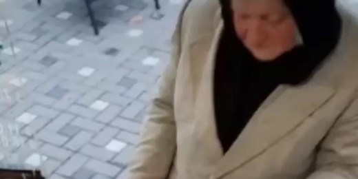 Engaging Outdoor Interaction Video in Beige Coat