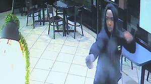 Employee's Life or Death Struggle with Donut Shop Robber Caught on Camera