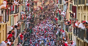 Top photos of thrilling moments and close calls at Spain’s San Fermín bull-running festival