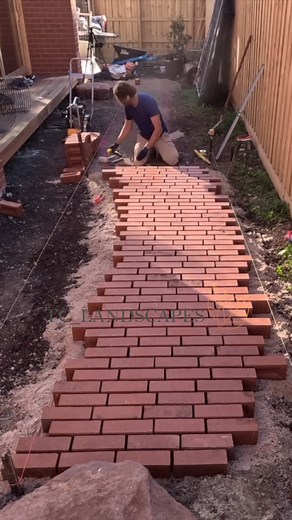 TC Landscapes on Instagram: "Turning Leftover Bricks into a Unique Garden Path. Watch the full video here: https://www.youtube.com/watch?v=3kJFv2EzWb4&list=PLOQuJqRgM2jSvvSUDGuO5Y5nBGt9yO8bX&index=3 Watch a unique brick path come to life using leftover bricks from a renovation—each laid sideways in an irregular, expressive pattern. Set on compacted crushed rock and coarse washed sand, this sustainable design allows water to drain naturally while softening the garden's edges."