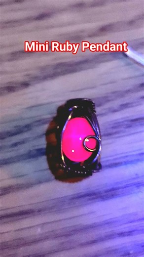 handwrapped ruby in copper pendant