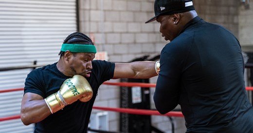 Shawn Porter takes part in a sparring session with his father