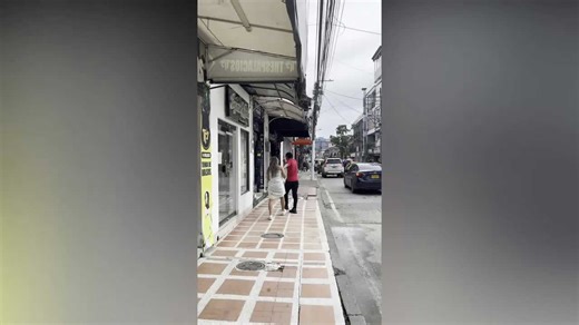 Wife caught cheating chases husband in bedsheet through streets begging forgiveness