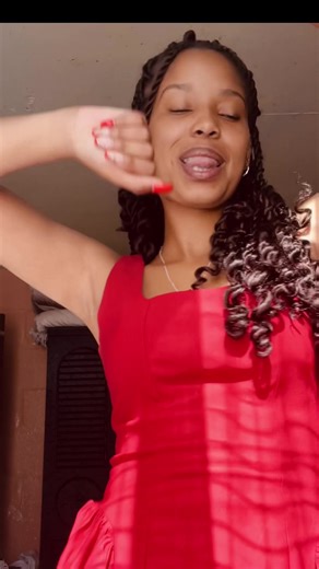 Captivating Dance Moves in a Red Dress