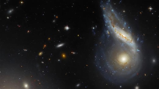 Two galaxies with millions of suns are colliding. Hubble captures mega merger