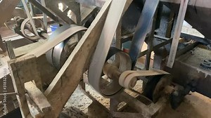 Pulley and belt drive rice mill