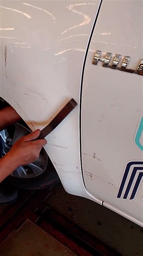 Reshape the fender back into its original form. #เคาะพ่นสี #ช่างทำสีรถยนต์ #automotive