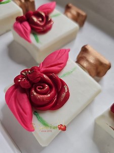 Dive into this tutorial where Rice Krispy Treats become an edible perfume bottle adorned with fondant roses! #explorepage #ricekrispies | The Sweet End