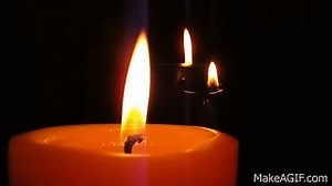 Flickering Candles Burning in the Night With Music From A Piano Composer on Make a GIF