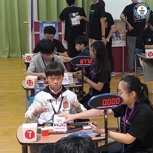 773K views · 12K reactions | Fastest time to solve a 3x3x3 rotating puzzle cube - 3.08 seconds by Yiheng Wang  | Guinness World Records | Facebook