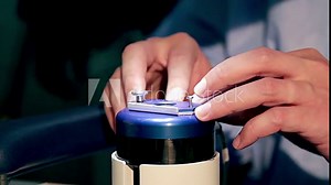 calibration and preparation for the excimer laser, laser for vision correction, Surgeon's hands in gloves performing laser eye vision correction correction