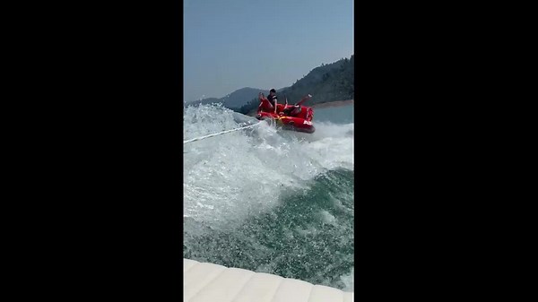 Two riders thrown from fast-moving tubing ride at Shasta Lake, California, USA