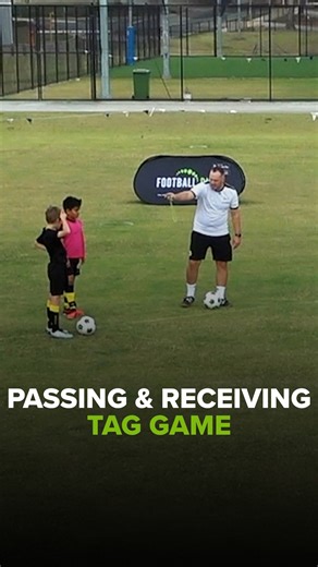 Passing & Receiving Tag Game ⚽️ In this fun game of tag, players without the ball must avoid being tagged by the designated tagger. To do this, they must use clever movements and turns to keep the opponent away 👏 Full practice here: https://footballdna.co.uk/sessions/passing-receiving-tag-game/ | Football DNA