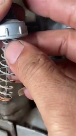 The stage of installing a spring on its part properly and correctly is carried out by an expert