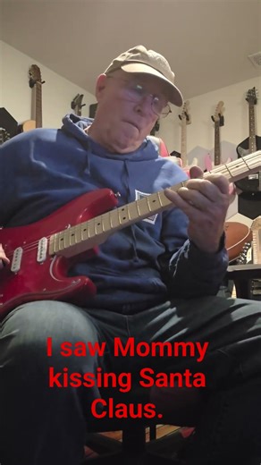 I saw mama kissing Santa Claus played on a red partscaster.