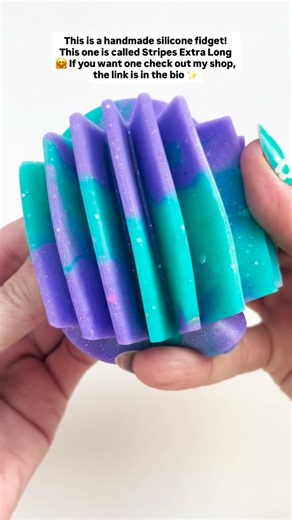 Fidget Factory Workshops on Instagram: "This is a handmade silicone fidget that glows in the dark! 🌙✨ This one’s called Stripes Extra Long — it’s stretchy, squishy, and so fun to play with! 💫 Available now in my shop — check out the link in my bio! 💖 #fidget #fidgets #sensory #stressrelief #adhd #autism #silicone #handmade #smallbusiness #etsy #netherlands #glowinthedark"