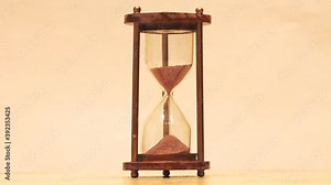 Time of the hourglass with red sand is elapsing
