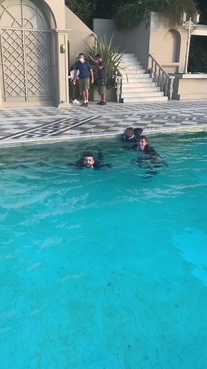 Men Swimming in Pool: A Day of Fun and Relaxation