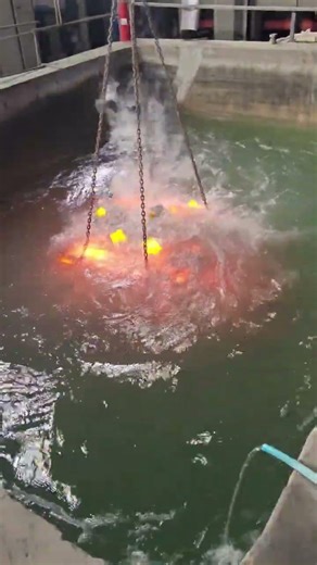 red-hot metal being submerged into a liquid bath Feb 01