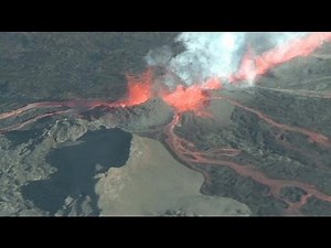 Iceland puts on a show as two of its volcanoes spew out lava