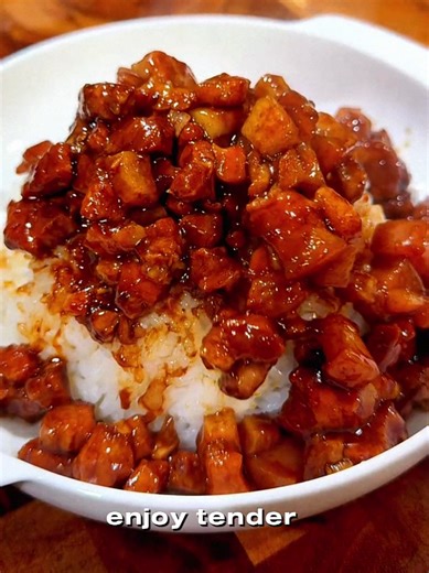 Homemade Braised Pork Rice for Under 5 Dollars . This braised pork rice is rich, tender, and packed with flavor. Slow simmered pork belly becomes soft and melts in your mouth, served over warm rice with braised eggs. This easy homemade comfort food recipe tastes better than takeout and costs less to make at home. Perfect for meal prep, weeknight dinners, and anyone who loves savory pork dishes. . Ingredients ● 2 pounds pork belly ● 1 tablespoon sliced ginger ● 1 small onion, diced ● 1 packet Tai