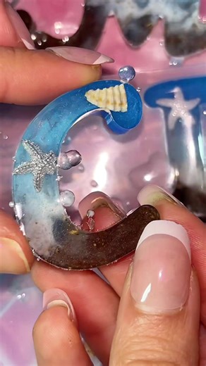 Resultado de todos o porta-chaves com novo formato, personalizados com tema de mar /praia 🌊 🏖️ ig.: @infinity_arte_store