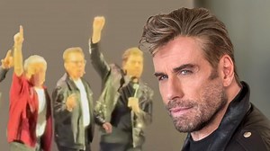 John Travolta made a surprise appearance at the Hollywood Bowl ahead of a sing-along with some of his 'Grease' co-stars! | Entertainment Tonight