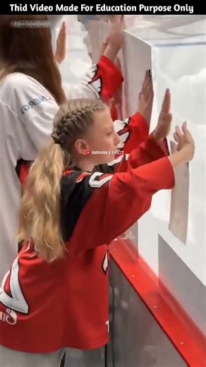 While playing hockey, the player threw the ball into the crowd, but