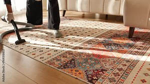 women cleaning with vacuum cleaner carpet,
